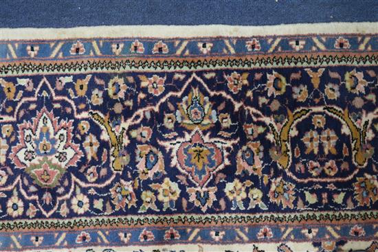 A Persian Tree of life ivory ground carpet W.275 x 180cm
